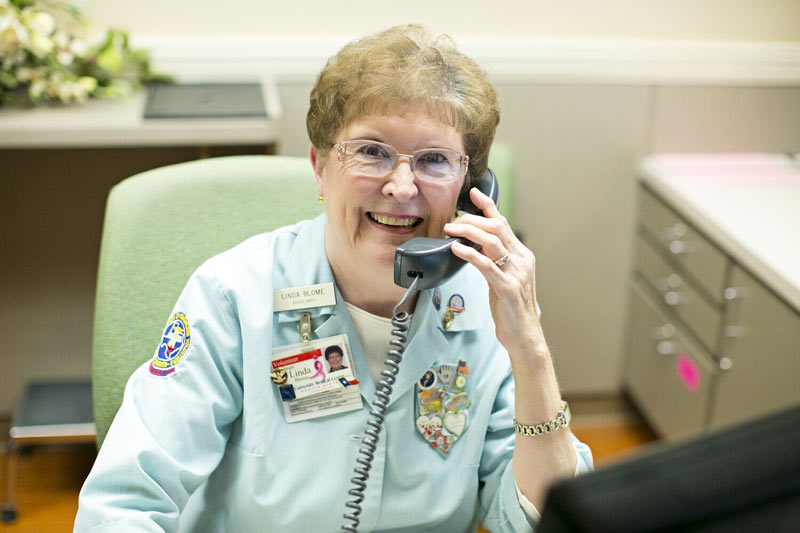 Volunteering - Woman Talking on the Phone